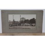 A 1920s photograph depicting Wrexham Farmers/Charles Street Mills vehicle fleet, 30cm x 17cm.