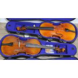 Two modern violas, each labelled 'Karl Hofner', with bows and hard cases.