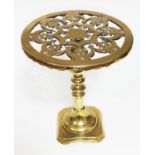 A 19th century brass trivet, height 30cm.