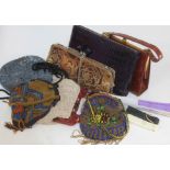 A group of vintage accessories including beadwork, crocodile leather purses, three fans.