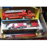 Boxed model trucks/fire engines.