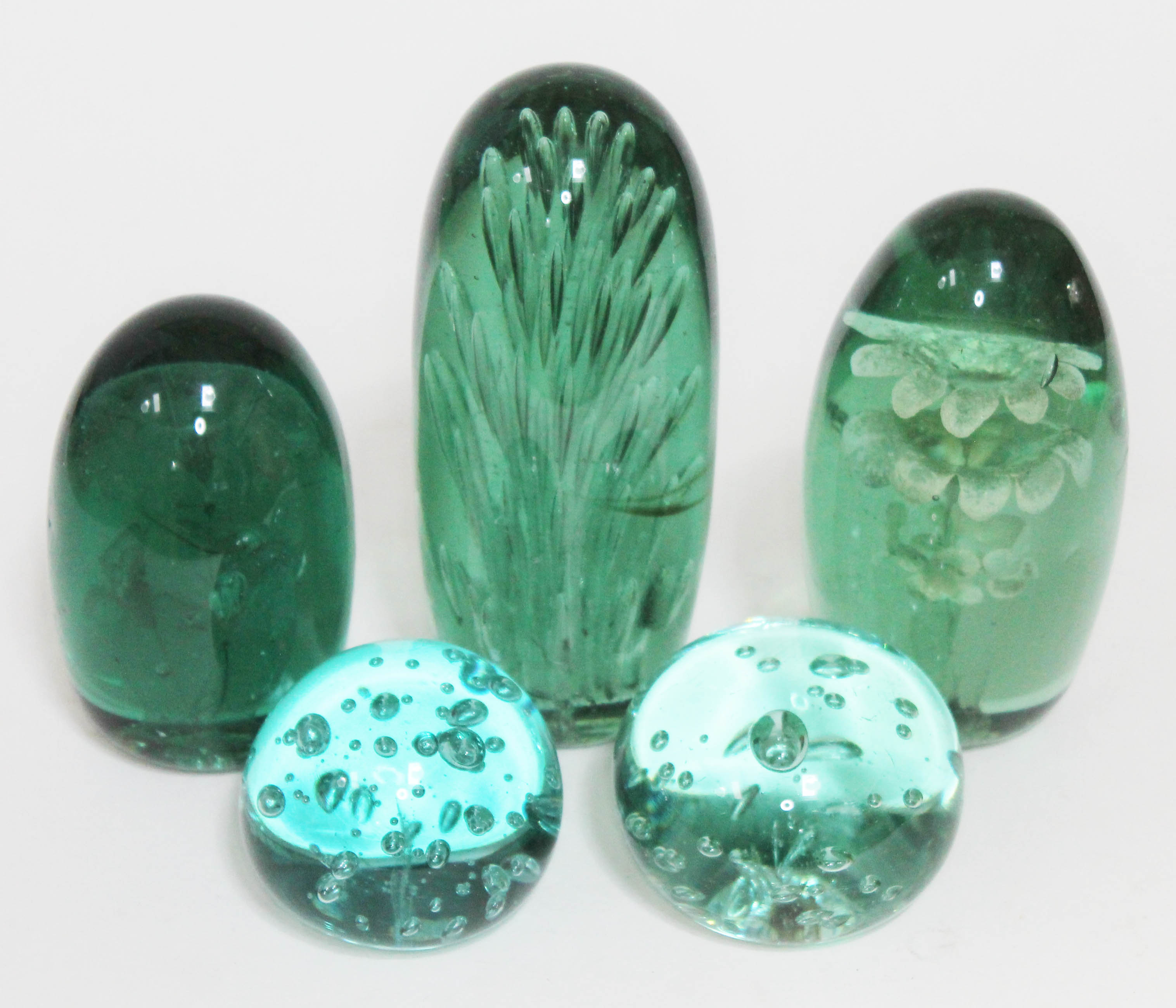 A group of four Victorian green glass dumps and one later, tallest 28cm.