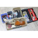 A quantity of violin spares and tools.