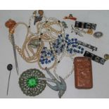 A quantity of costume jewellery and bric a brac, buttons and badges etc.