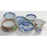 A quantity of Chinese and oriental porcelain including a Canton cup and saucer.