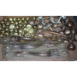 A box of brass door fittings including Art Nouveau style handles etc.