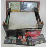 A box of stamp and stamp albums.