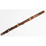 A 19th century box wood and ivory flute by G Astor & Co.