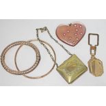 A mixed lot including a gilt bangle marked '925', a yellow metal bangle, a silver plated purse, a