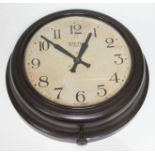 A Smith 8 Day bakelite cased wall clock, diam. 29cm.