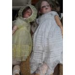 Two Armand Marseille bisque headed dolls.