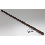 A Police teak night stick, length 77cm.