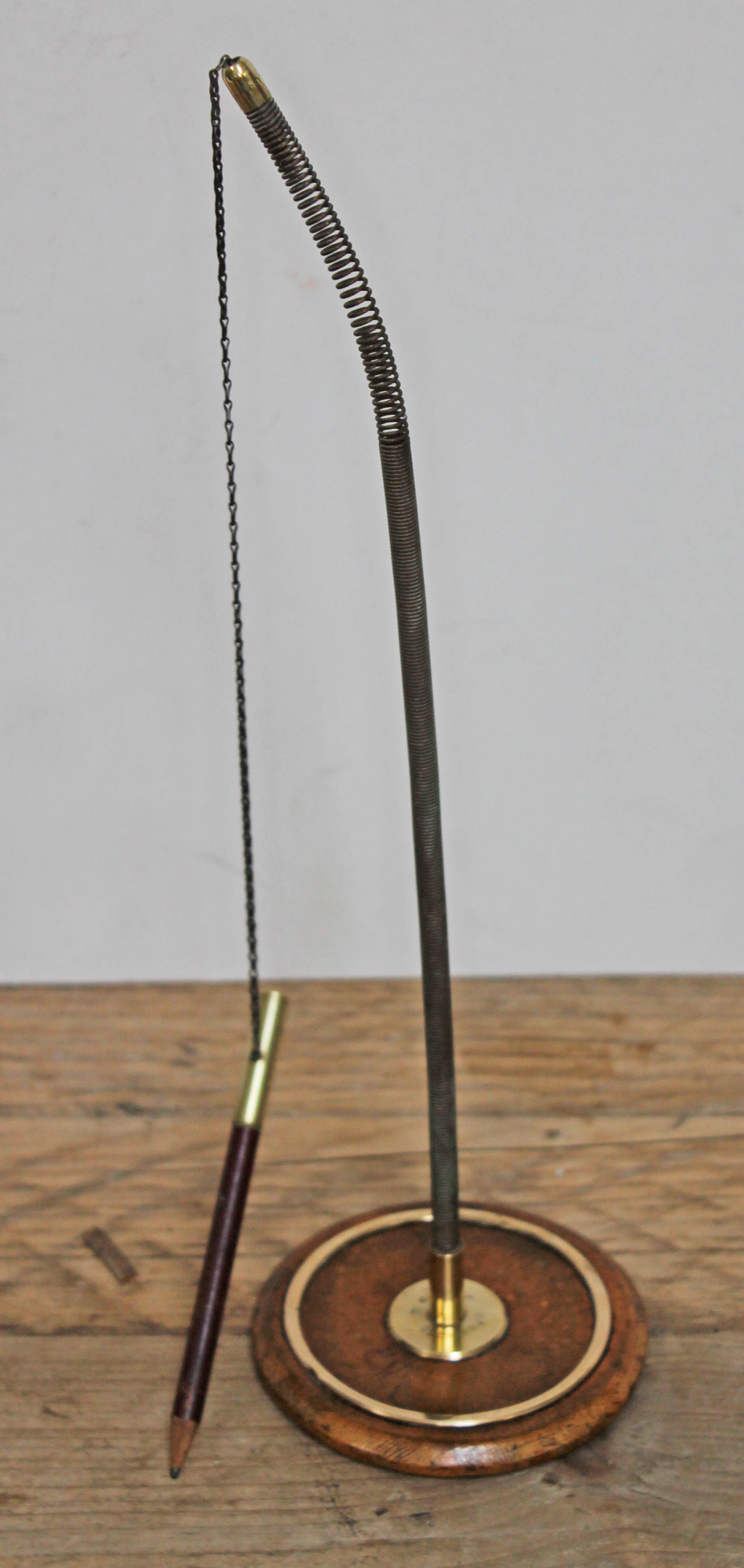 A brass mounted sprung pencil, height approx. 34cm.