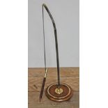 A brass mounted sprung pencil, height approx. 34cm.