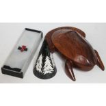 A mixed lot comprising a carved wooden frog, an Art Deco style perspex card box and a conical xmas