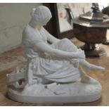 A Minton Parian ware figure formed as a seated lady with lyre, length 22cm.