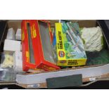 A box of model railway buildings, track, etc