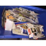 A tub of trade cards and cigarette cards