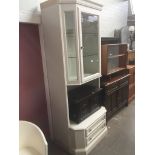 A modern white glazed cabinet