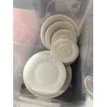 Plastic box of cream plates