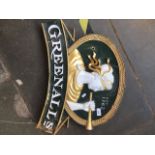 A Greenalls pub sign