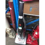 An upright Hoover vac cleaner