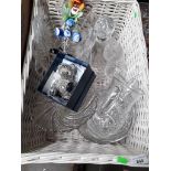 A basket of glassware and a silver plated christening gift