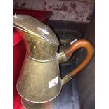 A brass jug and metal jardiniere
