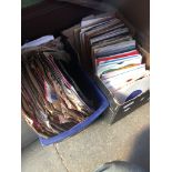 A box of 78s and a box of singles.