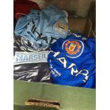 A box of football shirts and scarves