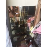 A large multi tinted mirror