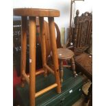 A pine stool and small oak stool