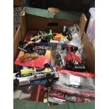 A box of toy racing cars, Brittens figures and Batman etc