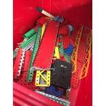 A crate of Meccano items