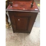 A mahogany pot cupboard