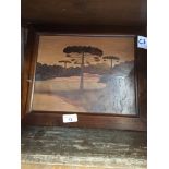 A wooden picture depicting trees.