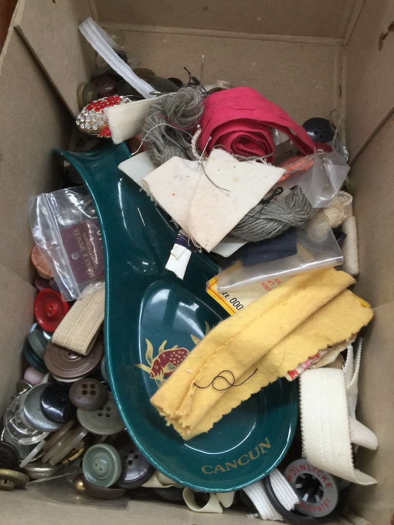 A box of sewing items, inc buttons, etc