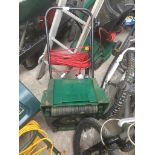 A Qualcast electric lawn mower