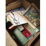 A box of misc items, mainly brushes, artist's items, etc.