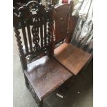 Two carved oak chairs