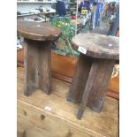 A pair of oak stools