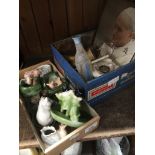Small box of pig ornaments and a tin of bric a brac