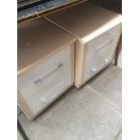 A pair of modern bedside cabinets