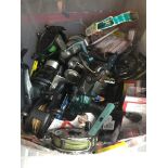 A box of fishing reels and tackle