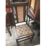 A set of 5 oak high back chairs with bergere backs