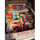 A mixed box of postcards, sticklebricks etc