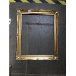 A gilt picture frame