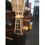 An oak pot cupboard and a pair of stools