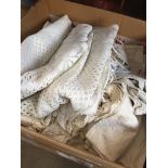 A box of linen, macrame, table cloths, etc.