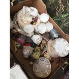 A box of mixed pottery including teaware and ornaments